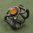 P 15 - Prsten: patinované stříbro, sluneční kámen